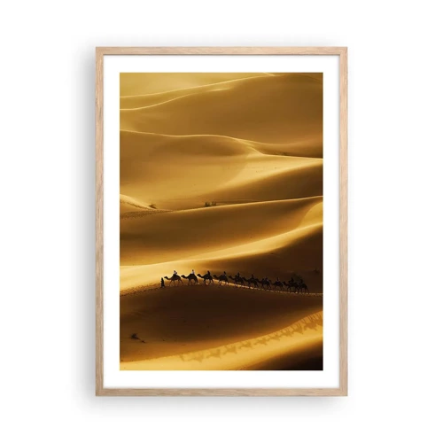 Poster in einem Rahmen aus heller Eiche - Wohnwagen in den Wüstenwellen - 50x70 cm