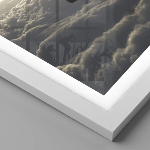 Poster in einem weißen Rahmen - Ein Wanderer über den Wolken - 91x61 cm