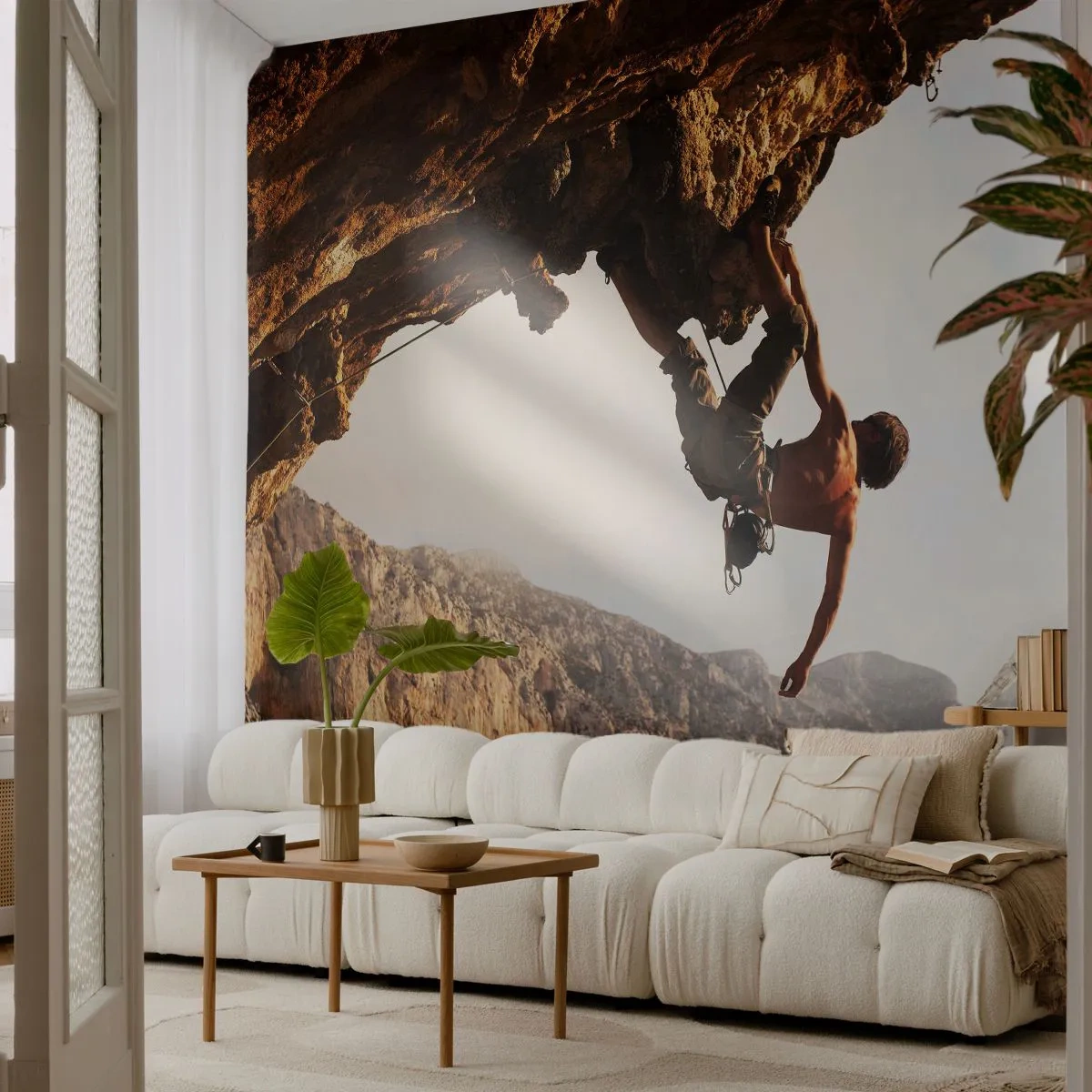 Fototapete Premium Sand - Klettern an einer steilen Klippe mit beeindruckender Aussicht - 100x70cm - Die Welt ist in einer Hand auf einem Felsblock geschrumpft - Moderne Wanddekoration für Wohnzimmer und Schlafzimmer ARTTOR
