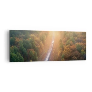 Bild auf Leinwand - Leinwandbild - Ein Zug in einem herbstlichen Wald im Morgengrauen - 140x50cm - Herbstreise - Moderne Wanddekoration für Wohnzimmer und Schlafzimmer ARTTOR
