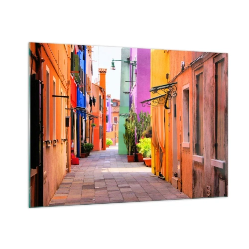 Glasbild - Bild auf glas - Eine farbenfrohe Straße mit Mietshäusern in warmen Farbtönen - 100x70cm - Regenbogengasse - Moderne Wanddekoration für Wohnzimmer und Schlafzimmer ARTTOR
