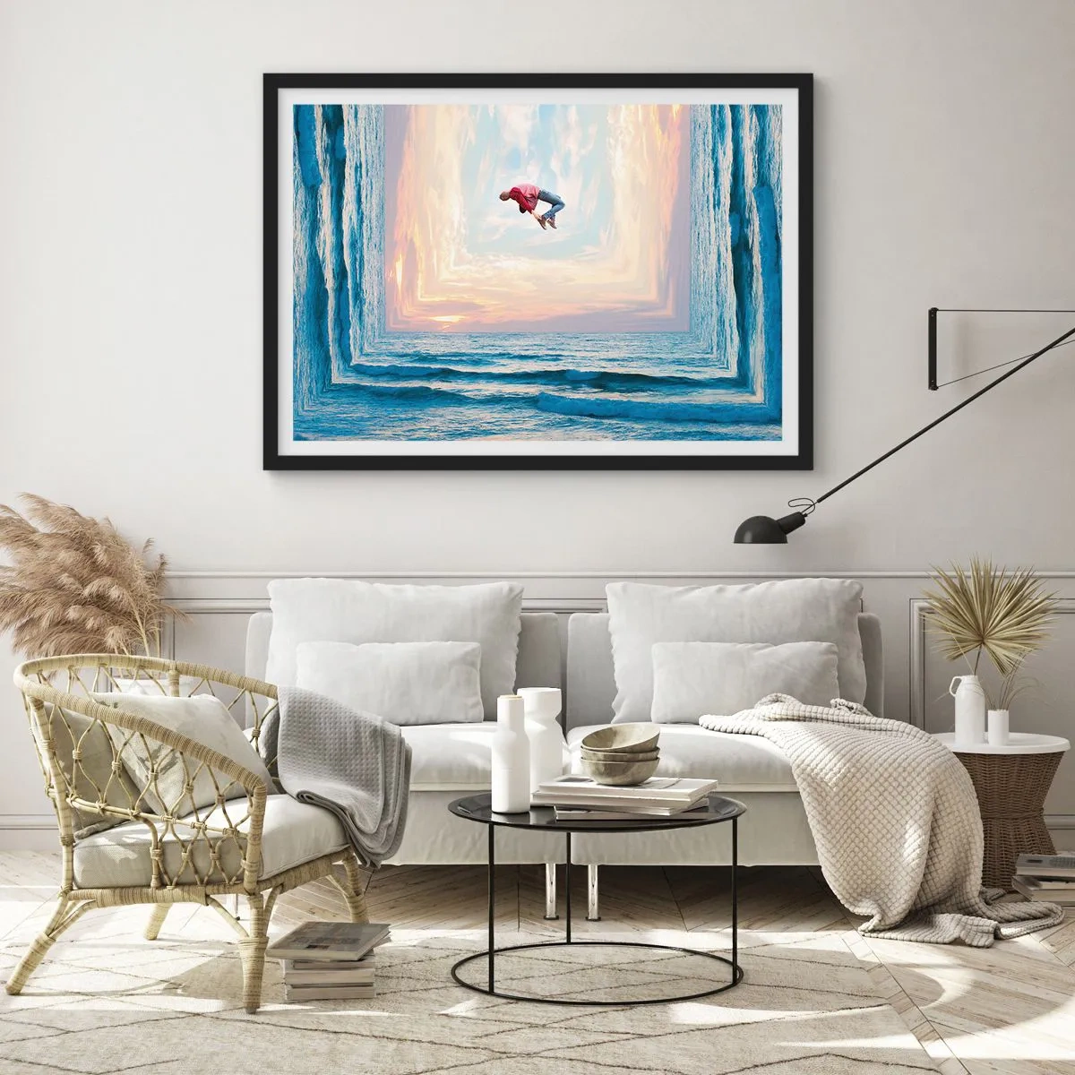 Poster in einem schwarzem Rahmen - Surrealer Sprung über das Meer im Rahmen - 100x70cm - In eine andere Dimension - Moderne Wanddekoration für Wohnzimmer und Schlafzimmer ARTTOR