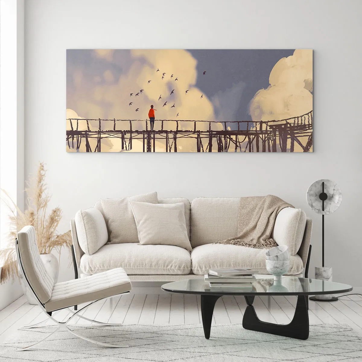Glasbild - Bild auf glas - Eine Figur auf einer Brücke zwischen Wolken mit Vögeln am Himmel - 140x50cm - Blaue Sehnsucht - Moderne Wanddekoration für Wohnzimmer und Schlafzimmer ARTTOR