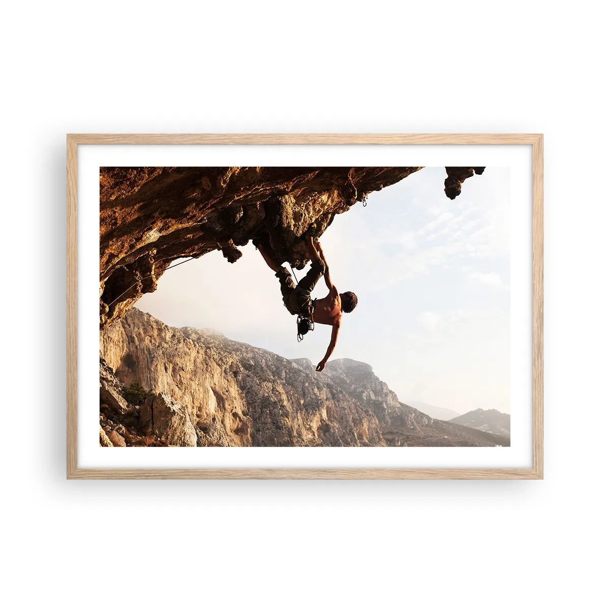 Poster in einem Rahmen aus heller Eiche - Die Welt ist in einer Hand auf einem Felsblock geschrumpft - 70x50 cm