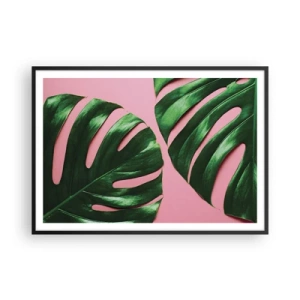 Poster in einem schwarzem Rahmen - Grüne Monstera-Blätter auf rosa Hintergrund - 100x70cm - Rendezvous im Grünen - Moderne Wanddekoration für Wohnzimmer und Schlafzimmer ARTTOR