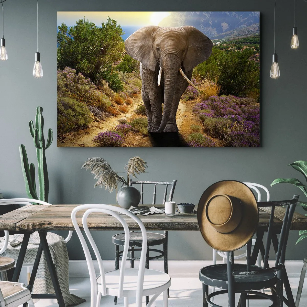 Bild auf Leinwand - Leinwandbild - Ein afrikanischer Elefant vor einer Savannen- und Berglandschaft - 70x50cm - So sah Eden aus - Moderne Wanddekoration für Wohnzimmer und Schlafzimmer ARTTOR
