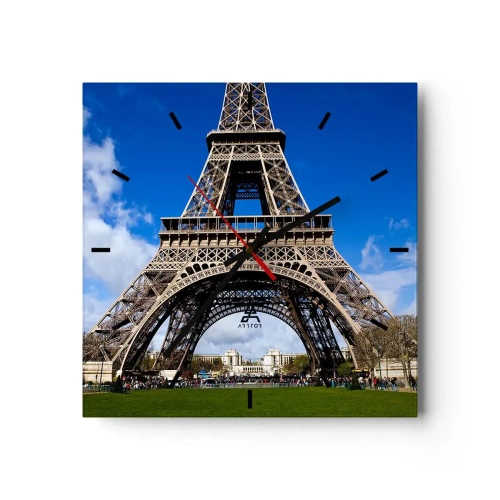 Wanduhr - Glasuhr - Der Eiffelturm vor dem Hintergrund eines blauen Himmels und eines grünen Parks - 30x30cm - Ganz Paris zu ihren Füßen - Moderne Wanddekoration für Wohnzimmer und Schlafzimmer ARTTOR