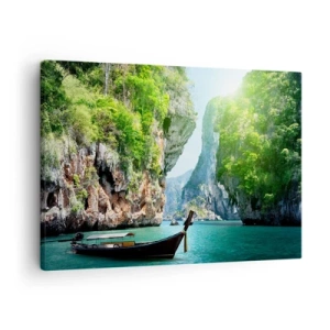 Bild auf Leinwand - Leinwandbild - Ein traditionelles Boot vor der Kulisse tropischer Klippen und türkisfarbenem Wasser - 70x50cm - Eine Einladung zu einer exotischen Reise - Moderne Wanddekoration für Wohnzimmer und Schlafzimmer ARTTOR