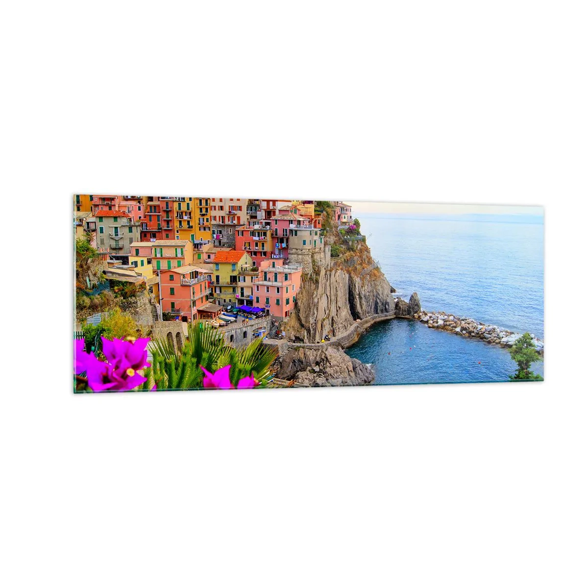 Glasbild - Bild auf glas - Bunte Häuser auf einer Klippe mit Blick auf das Meer in einer malerischen Landschaft - 140x50cm - Lachende Stadt - Moderne Wanddekoration für Wohnzimmer und Schlafzimmer ARTTOR