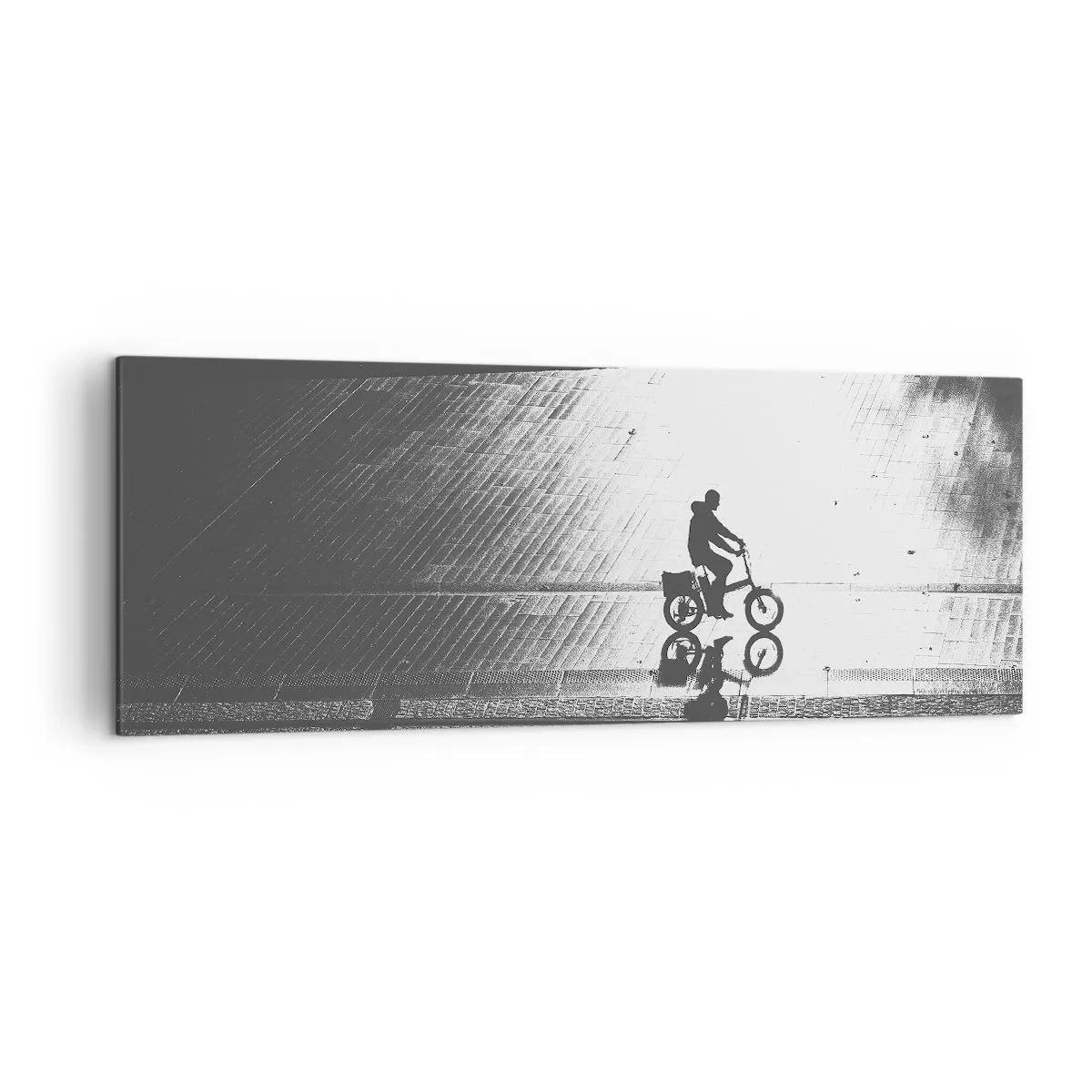 Bild auf Leinwand - Leinwandbild - Schwarz-weiße Silhouette eines Radfahrers auf einer nassen Straße - 140x50cm - Vor sich hin durch die Stadt - Moderne Wanddekoration für Wohnzimmer und Schlafzimmer ARTTOR