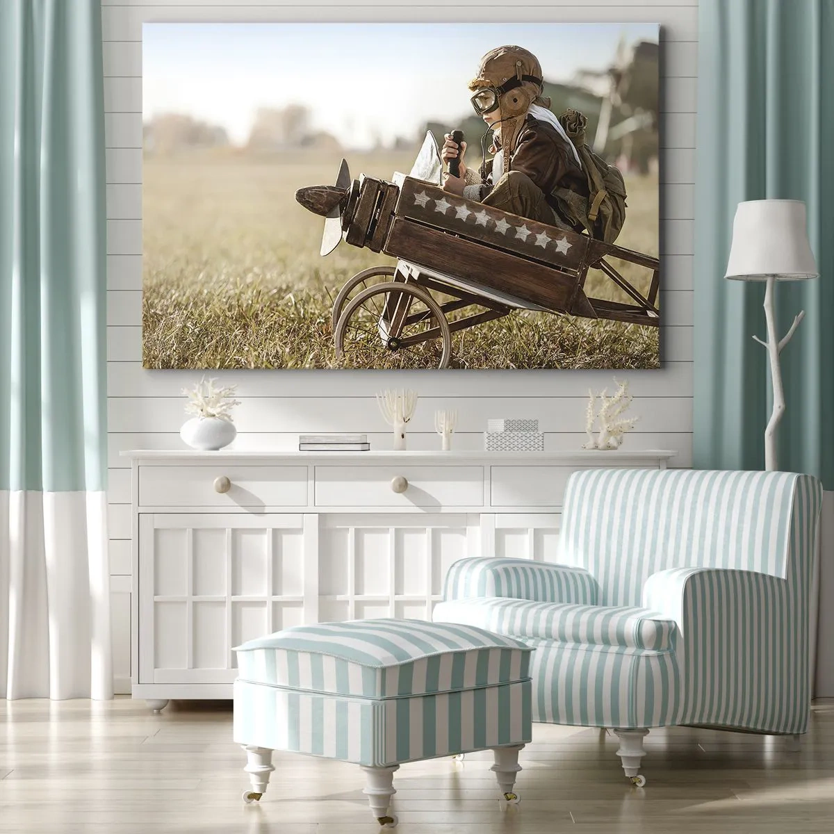 Bild auf Leinwand - Leinwandbild - Ein Kind in einem Spielzeugflugzeug mit einem Feld im Hintergrund - 70x50cm - Start in Richtung eines Traums - Moderne Wanddekoration für Wohnzimmer und Schlafzimmer ARTTOR