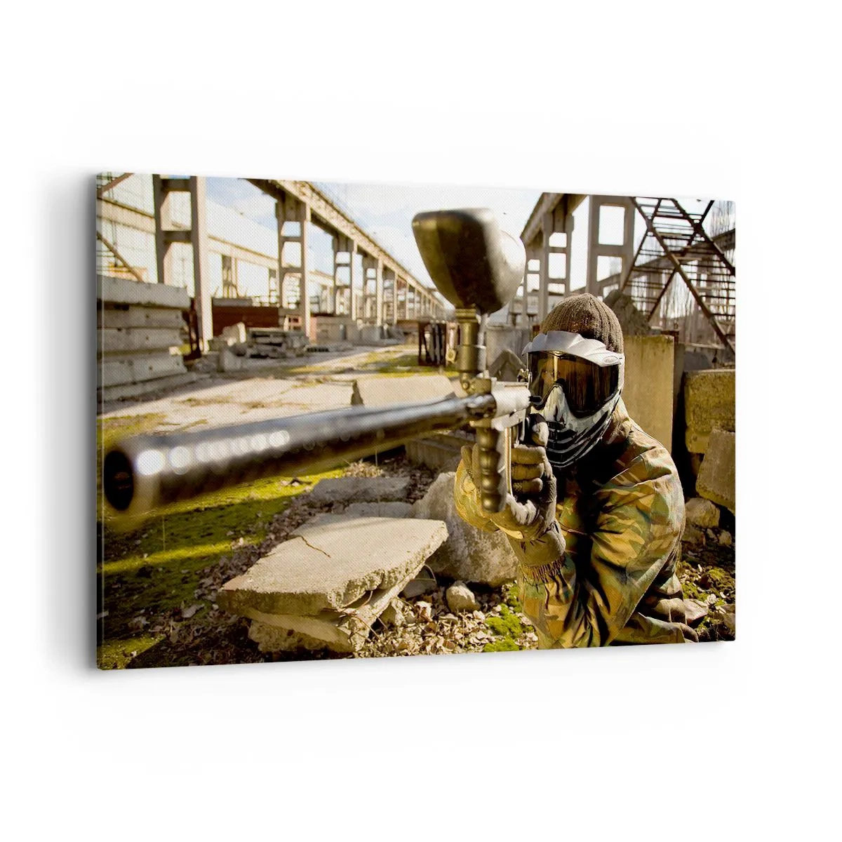 Bild auf Leinwand - Leinwandbild - Ein Paintball-Spieler in Tarnkleidung zielt mit einem Markierer - 120x80cm - Auch du kannst ein Held werden - Moderne Wanddekoration für Wohnzimmer und Schlafzimmer ARTTOR