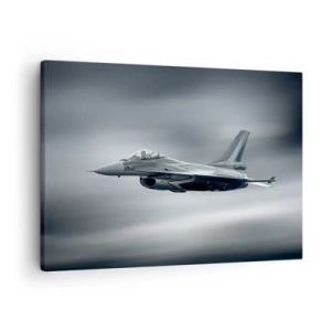 Bild auf Leinwand - Leinwandbild - Ein Kampfjet im Flug vor einem bewölkten Himmel - 70x50cm - Wirst du herausfordern? - Moderne Wanddekoration für Wohnzimmer und Schlafzimmer ARTTOR