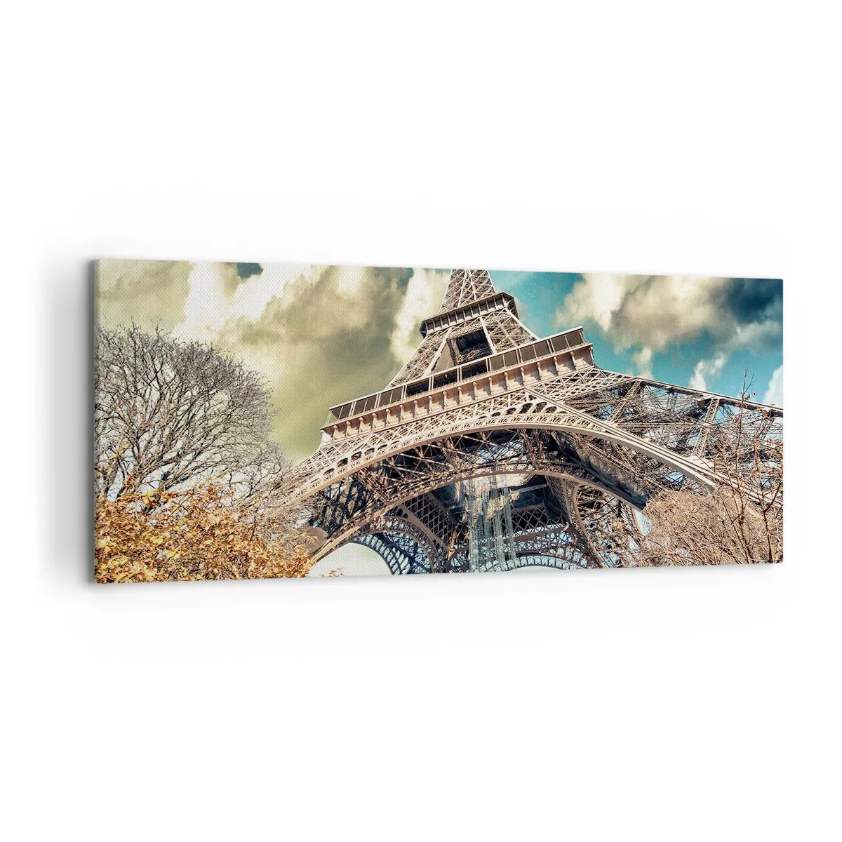 Bild auf Leinwand - Leinwandbild - Der Eiffelturm von unten in herbstlicher Kulisse - 120x50cm - Und im Herbst in Paris ... - Moderne Wanddekoration für Wohnzimmer und Schlafzimmer ARTTOR