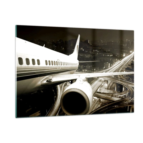 Glasbild - Bild auf glas - Ein Flugzeug über der Stadt bei Nacht mit Industrieatmosphäre - 120x80cm - In die Nacht fliegen - Moderne Wanddekoration für Wohnzimmer und Schlafzimmer ARTTOR