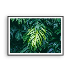 Poster in einem schwarzem Rahmen - Grüne Blätter in einem dichten tropischen Arrangement - 100x70cm - Tauchen Sie ein in die Frische - Moderne Wanddekoration für Wohnzimmer und Schlafzimmer ARTTOR