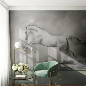 Fototapete Premium Canvas - Ein weißes Pferd in einem dynamischen Sprung vor dem Hintergrund nebliger Wolken. - 100x70cm - Zwischen Aufwachen und Schlafen - Moderne Wanddekoration für Wohnzimmer und Schlafzimmer ARTTOR