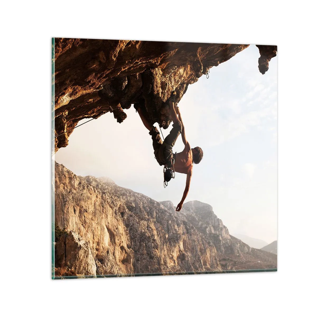 Glasbild - Bild auf glas - Die Welt ist in einer Hand auf einem Felsblock geschrumpft - 70x70 cm