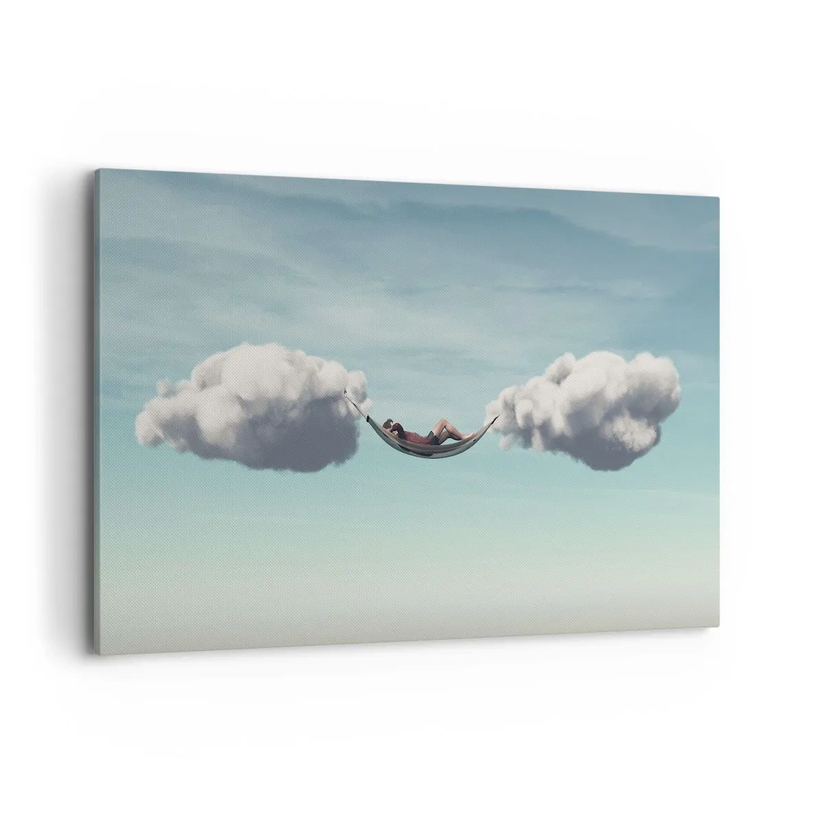 Bild auf Leinwand - Leinwandbild - Eine Person entspannt in einer Hängematte in den Wolken - 120x80cm - Die Behaglichkeit des Augenblicks - Moderne Wanddekoration für Wohnzimmer und Schlafzimmer ARTTOR