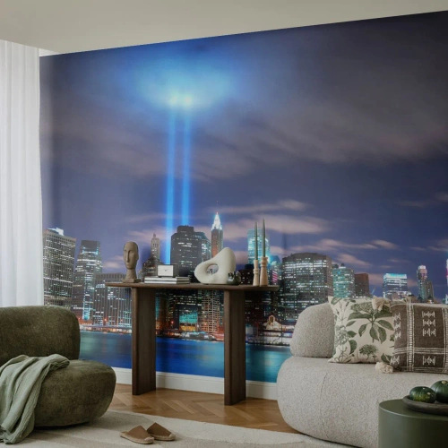 Fototapete Premium Canvas - Nachtstadtpanorama mit zwei hellen Lichtstrahlen am Himmel - 100x70cm - Erreiche den Himmel mit dem Licht - Moderne Wanddekoration für Wohnzimmer und Schlafzimmer ARTTOR