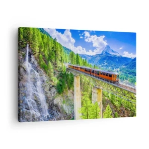 Bild auf Leinwand - Leinwandbild - Eine Achterbahn auf einer Brücke mit Blick auf einen Wasserfall und Berge - 70x50cm - Jetzt sind Alpen dran - Moderne Wanddekoration für Wohnzimmer und Schlafzimmer ARTTOR