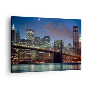 Bild auf Leinwand - Leinwandbild - New York City Bridge bei Nacht mit beleuchteten Gebäuden - 70x50cm - Leuchtende Nacht - Moderne Wanddekoration für Wohnzimmer und Schlafzimmer ARTTOR