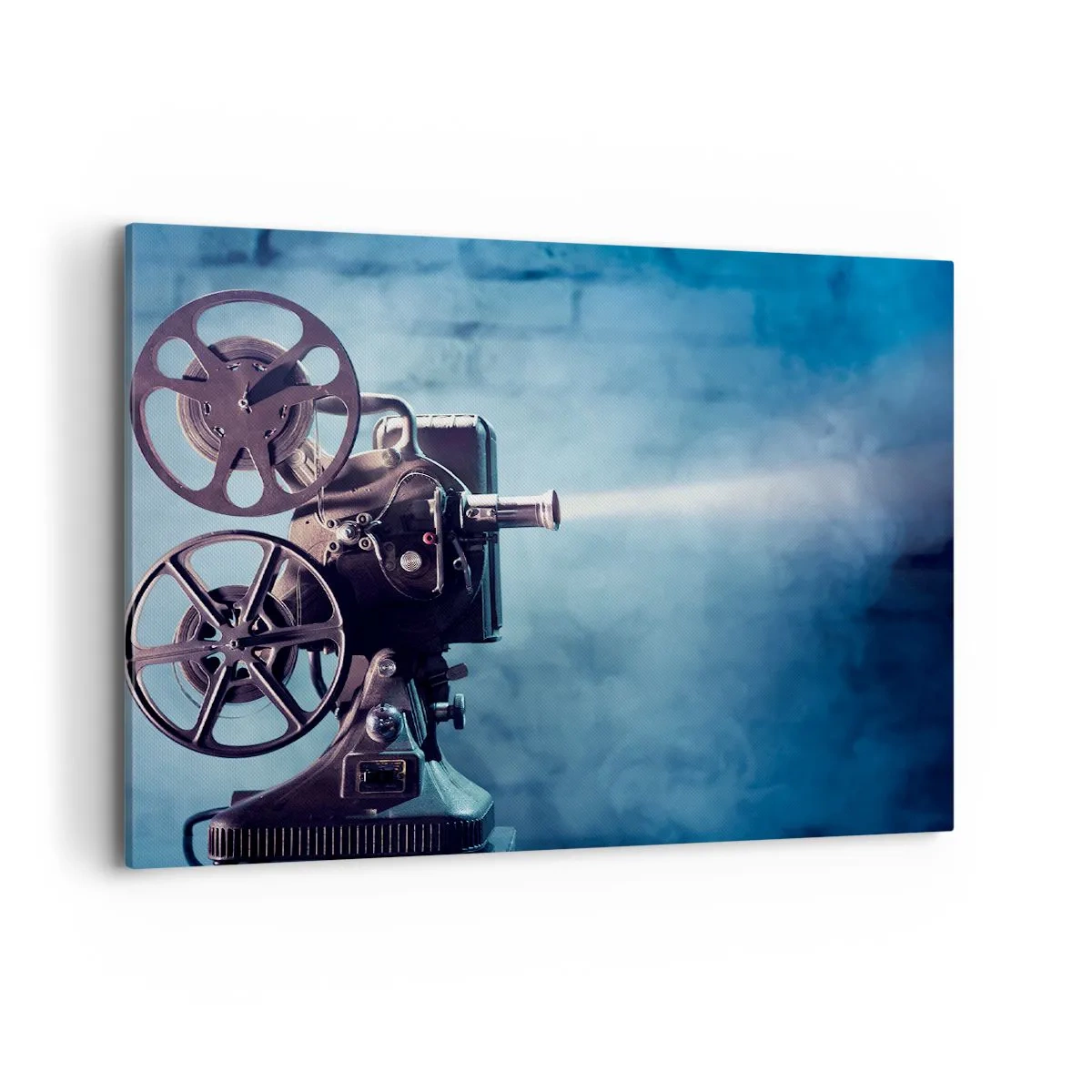 Bild auf Leinwand - Leinwandbild - Ein alter Filmprojektor wirft Licht vor einen blauen Hintergrund - 100x70cm - Im alten Kino - Moderne Wanddekoration für Wohnzimmer und Schlafzimmer ARTTOR