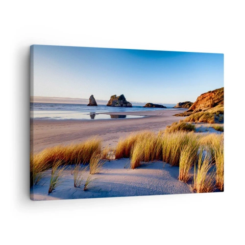 Bild auf Leinwand - Leinwandbild - Ein malerischer Strand mit Blick auf die Felsen und das Meer bei Sonnenuntergang - 70x50cm - Für Friedenssuchende - Moderne Wanddekoration für Wohnzimmer und Schlafzimmer ARTTOR