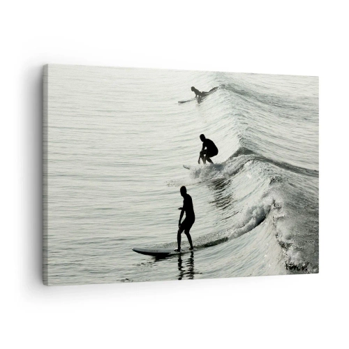 Bild auf Leinwand - Leinwandbild - Surfer auf den Wellen in einer monochromen Aufnahme - 70x50cm - Gegen die Welle - Moderne Wanddekoration für Wohnzimmer und Schlafzimmer ARTTOR