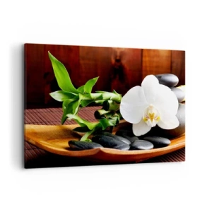Bild auf Leinwand - Leinwandbild - Weiße Orchidee mit Bambus vor einem Steinhintergrund im Zen-Stil - 120x80cm - Geben Sie sich dem Hauch der Natur hin - Moderne Wanddekoration für Wohnzimmer und Schlafzimmer ARTTOR