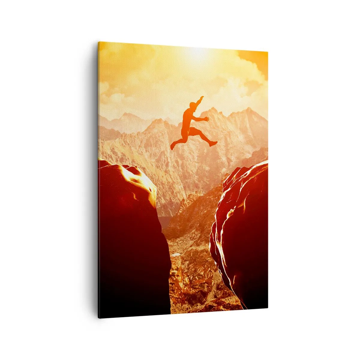 Bild auf Leinwand - Leinwandbild - Eine Figur springt zwischen Felsen mit Bergen im Hintergrund - 70x100cm - Grenzen überschreiten - Moderne Wanddekoration für Wohnzimmer und Schlafzimmer ARTTOR