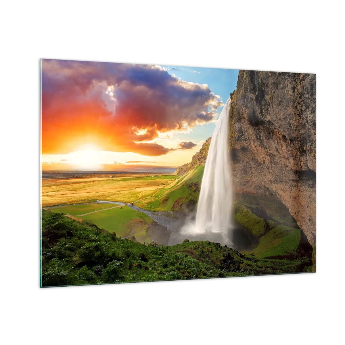Glasbild - Bild auf glas - Isländischer Wasserfall in den Strahlen der untergehenden Sonne - 100x70cm - Die Fülle des isländischen Sommers - Moderne Wanddekoration für Wohnzimmer und Schlafzimmer ARTTOR