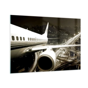 Glasbild - Bild auf glas - Ein Flugzeug über der Stadt bei Nacht mit Industrieatmosphäre - 100x70cm - In die Nacht fliegen - Moderne Wanddekoration für Wohnzimmer und Schlafzimmer ARTTOR