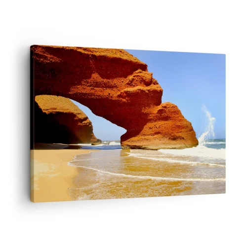 Bild auf Leinwand - Leinwandbild - Ein natürlicher Felsbogen an einem Strand mit blauem Himmel und Wellen - 70x50cm - Wasser und Wind seit Tausenden von Jahren - Moderne Wanddekoration für Wohnzimmer und Schlafzimmer ARTTOR