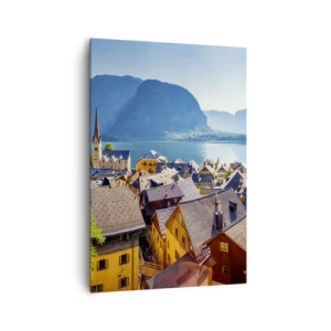 Bild auf Leinwand - Leinwandbild - Ein malerisches Dorf an einem See, umgeben von Bergen an einem sonnigen Tag - 70x100cm - Es könnte nicht malerischer sein - Moderne Wanddekoration für Wohnzimmer und Schlafzimmer ARTTOR