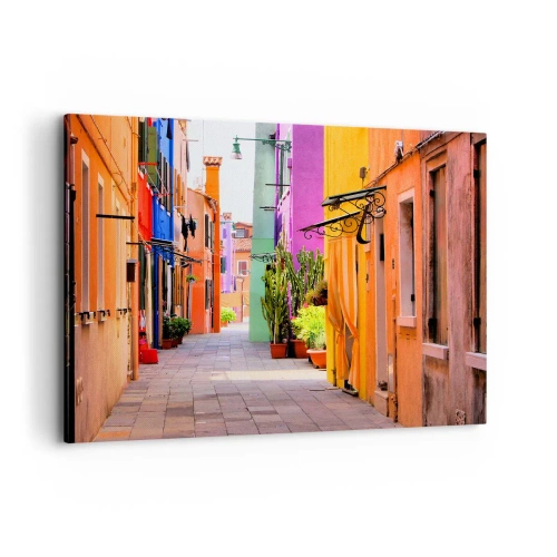 Bild auf Leinwand - Leinwandbild - Eine bunte Straße mit Mietshäusern in hellen Farbtönen - 100x70cm - Regenbogengasse - Moderne Wanddekoration für Wohnzimmer und Schlafzimmer ARTTOR