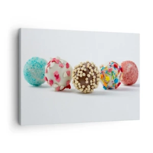 Bild auf Leinwand - Leinwandbild - Bunte Pralinen mit Dekorationen auf weißem Hintergrund - 70x50cm - Das Leben kann süß sein - Moderne Wanddekoration für Wohnzimmer und Schlafzimmer ARTTOR
