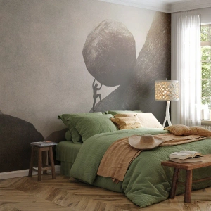 Fototapete Premium Sand - Eine Figur, die in einer zerklüfteten Landschaft einen Felsbrocken bergauf schiebt - 100x70cm - Ich glaube wider alle Hoffnung - Moderne Wanddekoration für Wohnzimmer und Schlafzimmer ARTTOR