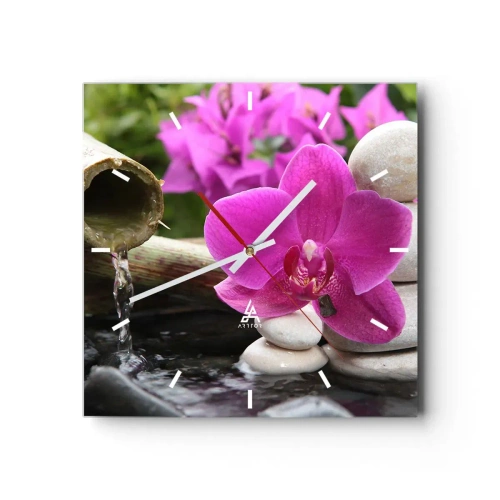 Wanduhr - Glasuhr - Lila Orchidee, Steine und Bambus mit Wasser in einer entspannenden Umgebung - 30x30cm - Du ruhst dich schon aus - Moderne Wanddekoration für Wohnzimmer und Schlafzimmer ARTTOR