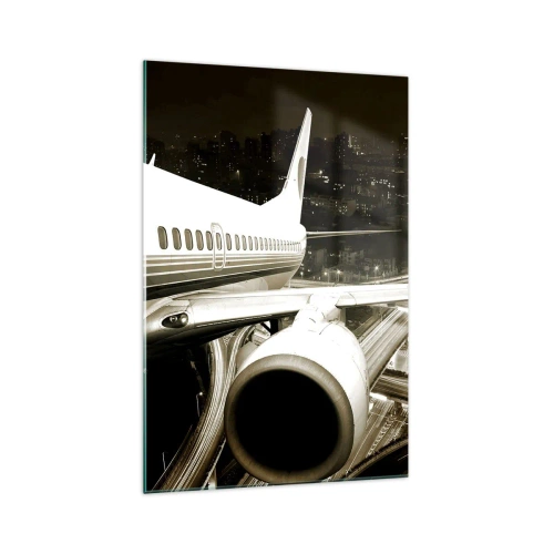Glasbild - Bild auf glas - Ein Flugzeug über einer nächtlichen Stadt mit beleuchteten Autobahnen - 70x100cm - In die Nacht fliegen - Moderne Wanddekoration für Wohnzimmer und Schlafzimmer ARTTOR