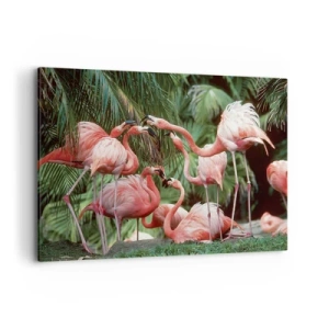 Bild auf Leinwand - Leinwandbild - Eine Gruppe von Flamingos in einer tropischen Umgebung, umgeben von Palmen - 100x70cm - Nachmittagsklatsch - Moderne Wanddekoration für Wohnzimmer und Schlafzimmer ARTTOR