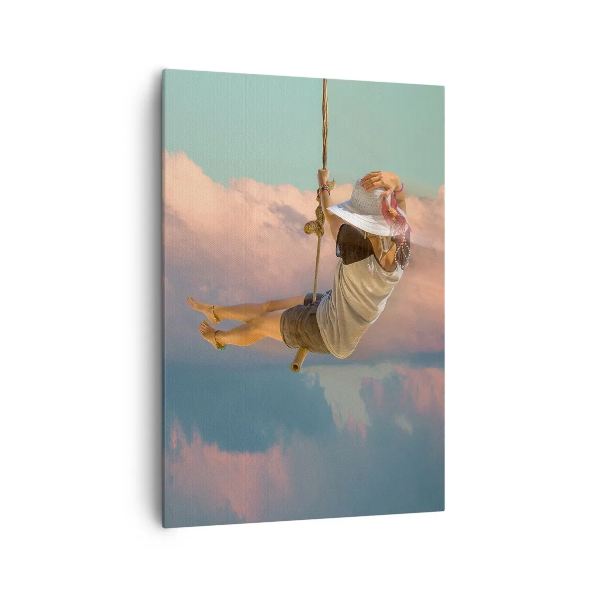 Bild auf Leinwand - Leinwandbild - Frau auf einer Schaukel zwischen rosa Wolken - 70x100cm - Spaß in den Wolken - Moderne Wanddekoration für Wohnzimmer und Schlafzimmer ARTTOR
