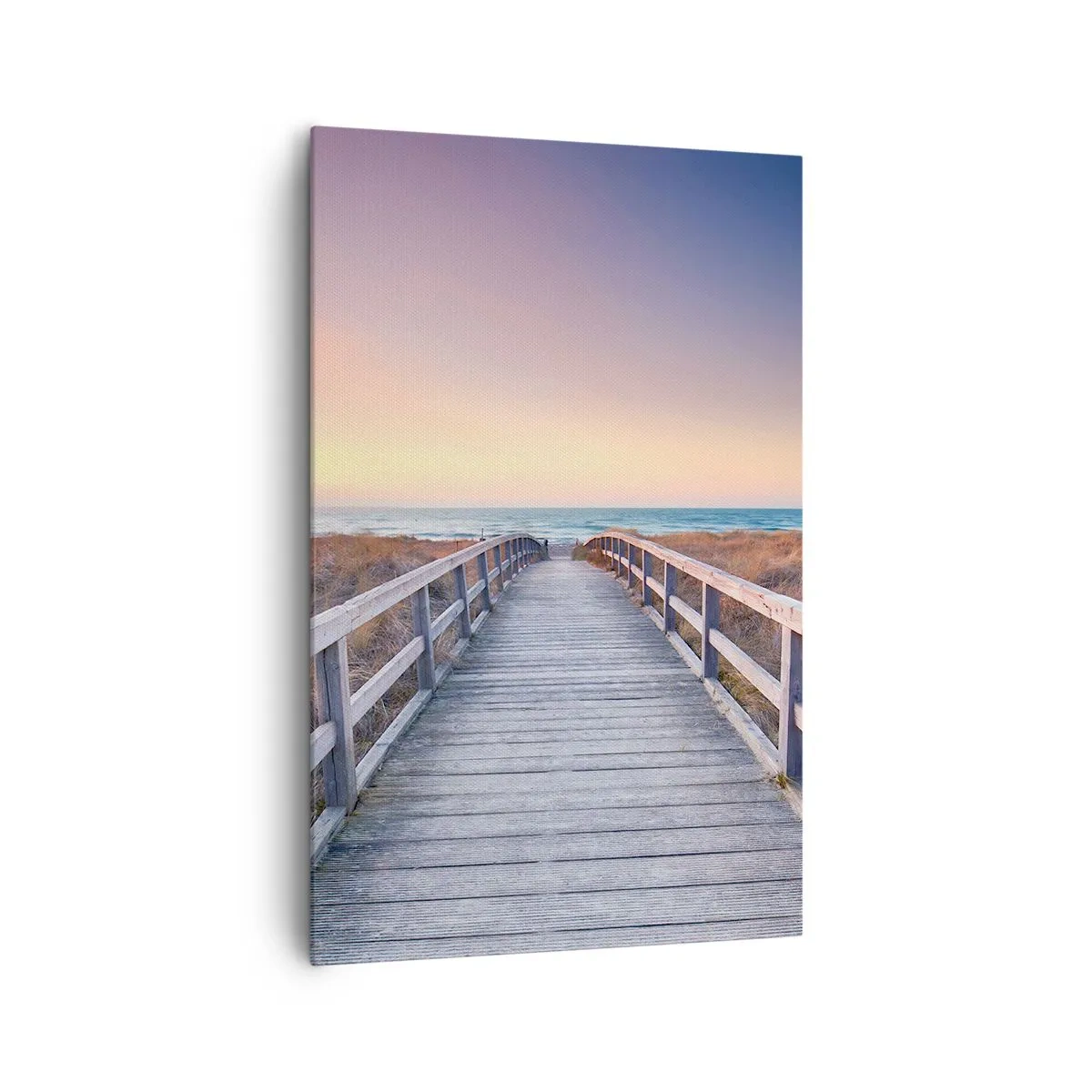 Bild auf Leinwand - Leinwandbild - Ein Holzsteg führt bei Sonnenuntergang zum Strand, der Himmel ist in Pastellfarben gemalt. - 80x120cm - Baltische Abend-Aurora - Moderne Wanddekoration für Wohnzimmer und Schlafzimmer ARTTOR