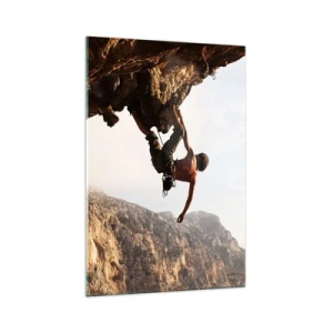 Glasbild - Bild auf glas - Ein Kletterer auf einer steilen Klippe in den Bergen im Sonnenschein - 70x100cm - Die Welt ist in einer Hand auf einem Felsblock geschrumpft - Moderne Wanddekoration für Wohnzimmer und Schlafzimmer ARTTOR