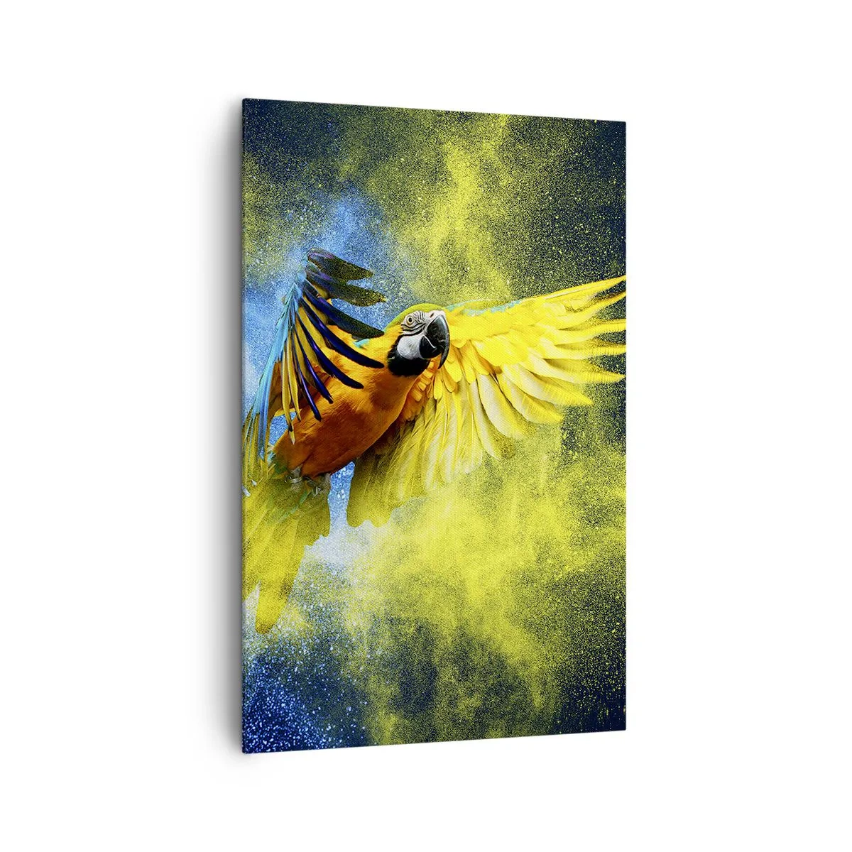Bild auf Leinwand - Leinwandbild - Ein Papagei im Flug vor einem Hintergrund aus farbenfrohen Explosionen in Gelb und Blau. - 80x120cm - Im blauen und goldenen Staub - Moderne Wanddekoration für Wohnzimmer und Schlafzimmer ARTTOR