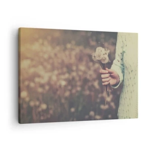Bild auf Leinwand - Leinwandbild - Eine Hand hält Löwenzahn vor dem unscharfen Hintergrund eines Feldes voller Blumen. - 70x50cm - Bitte behalte sie - Moderne Wanddekoration für Wohnzimmer und Schlafzimmer ARTTOR