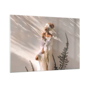 Glasbild - Bild auf glas - Eine Frau im Boho-Stil vor dem Hintergrund einer hellen Wand und Pflanzenschatten - 100x70cm - Die Sonne und das Mädchen - Moderne Wanddekoration für Wohnzimmer und Schlafzimmer ARTTOR