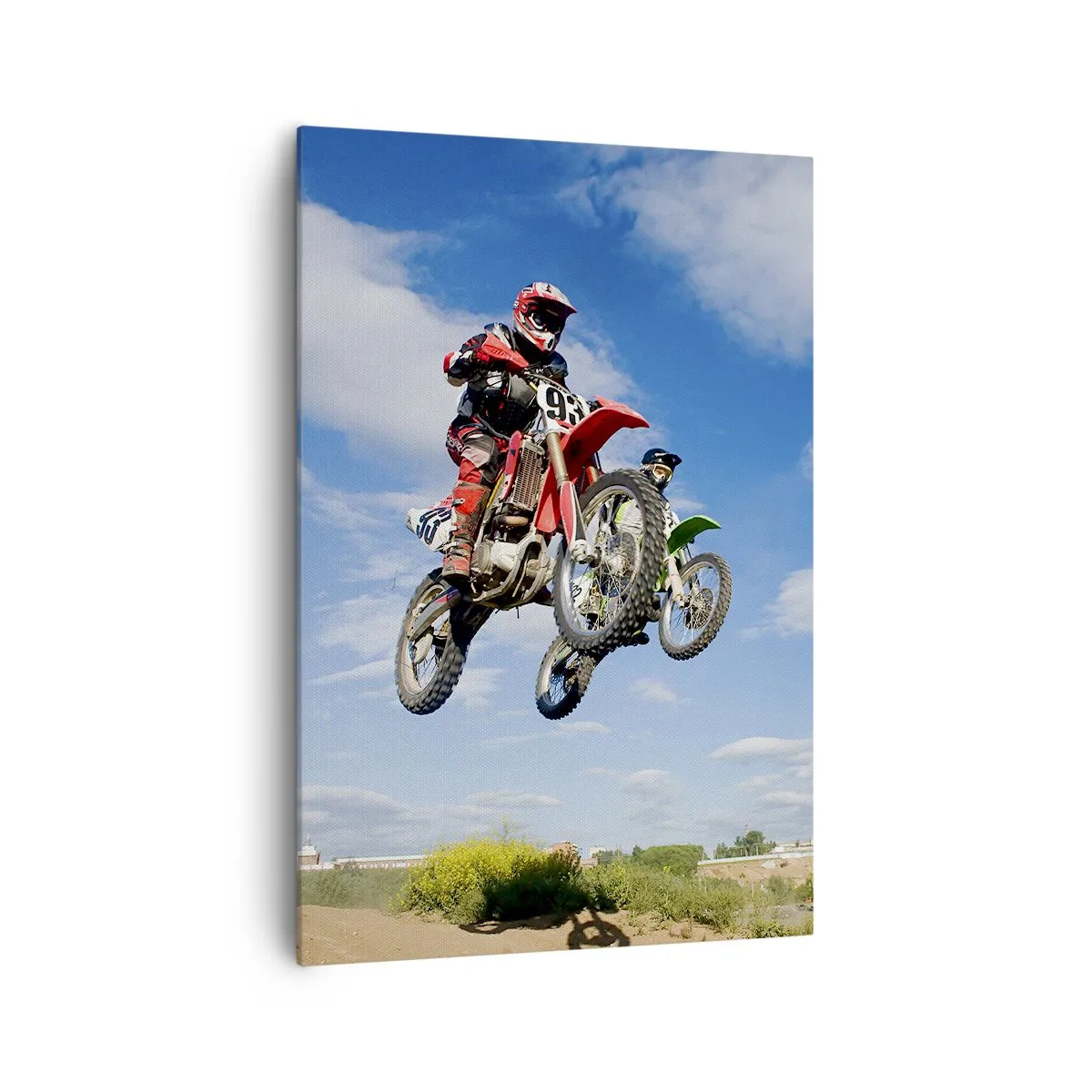Bild auf Leinwand - Leinwandbild - Fahrer auf Motocross-Motorrädern in der Luft während eines Sprunges - 70x100cm - Himmelssprung - Moderne Wanddekoration für Wohnzimmer und Schlafzimmer ARTTOR