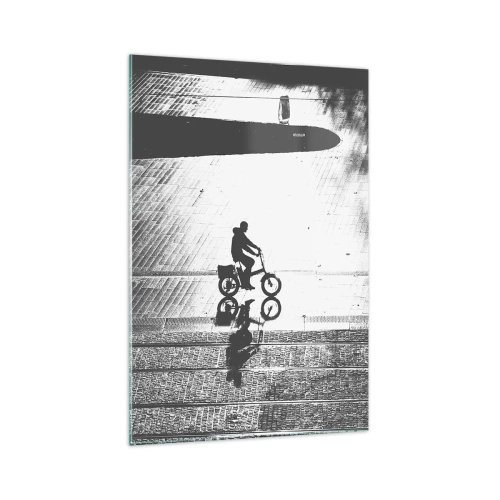 Glasbild - Bild auf glas - Schwarz-weiße Silhouette eines Radfahrers auf einer nassen Straße - 70x100cm - Vor sich hin durch die Stadt - Moderne Wanddekoration für Wohnzimmer und Schlafzimmer ARTTOR