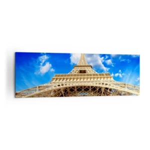 Bild auf Leinwand - Leinwandbild - Der Eiffelturm von unten vor blauem Himmel - 160x50cm - In den Himmel und in die Wolken gehen - Moderne Wanddekoration für Wohnzimmer und Schlafzimmer ARTTOR
